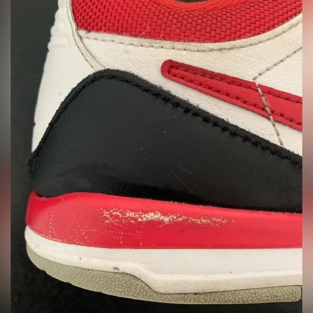 Nike Air Jordan Legacy 312 Low Fire White, Red, and Black Sneakers